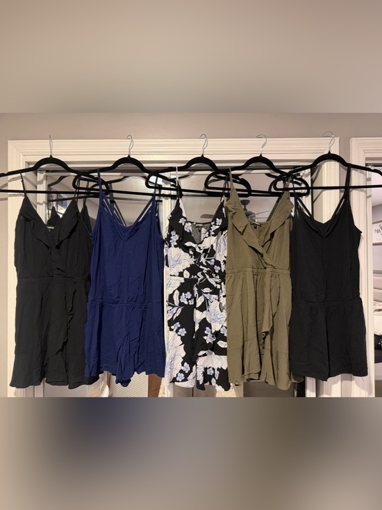 Express Dresses & Skirts - Express rompers and dresses featuring spaghetti straps, ruffles, & floral prints